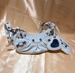 Balenciaga white fine-grain sheepskin with aged silver metal accents