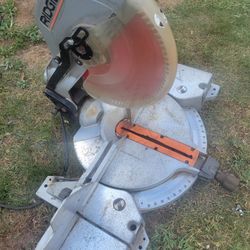 RIDGID MITER SAW WORKS GREAT.  WAS ASKING 190.00 TODAY I.LL TAKE 150.00  CASH