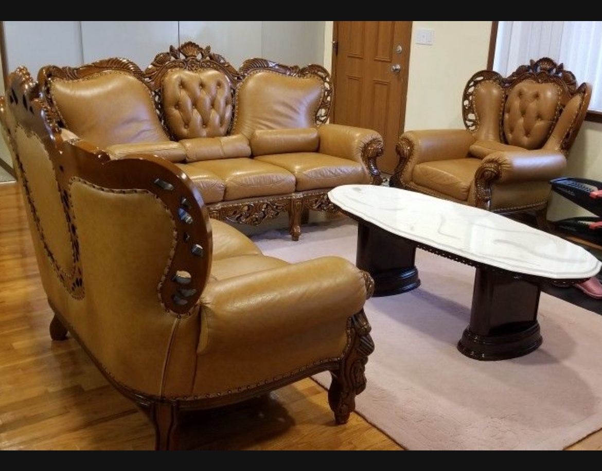 A set of luxury Leather sofa, loveseat and chair. 