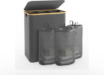 20$ almost new , 4 section removal laundry bags