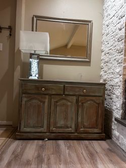 Dresser, mirror, lamp
