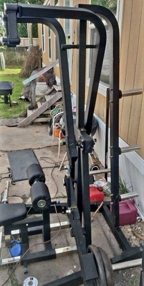 $150 FIRM (Used) Plate Loaded Lat Pulldown Weights included!