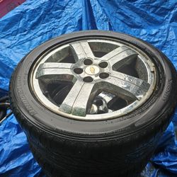 Set of 4 CHEVY 225/50/17 INCH CHROME RIMS WITH TIRES. (WHEELS)