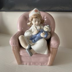 “Playing Nurse” Nao /part Of Lladro Group