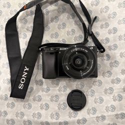 Sony Alpha a6000 w/ kit lens and battery
