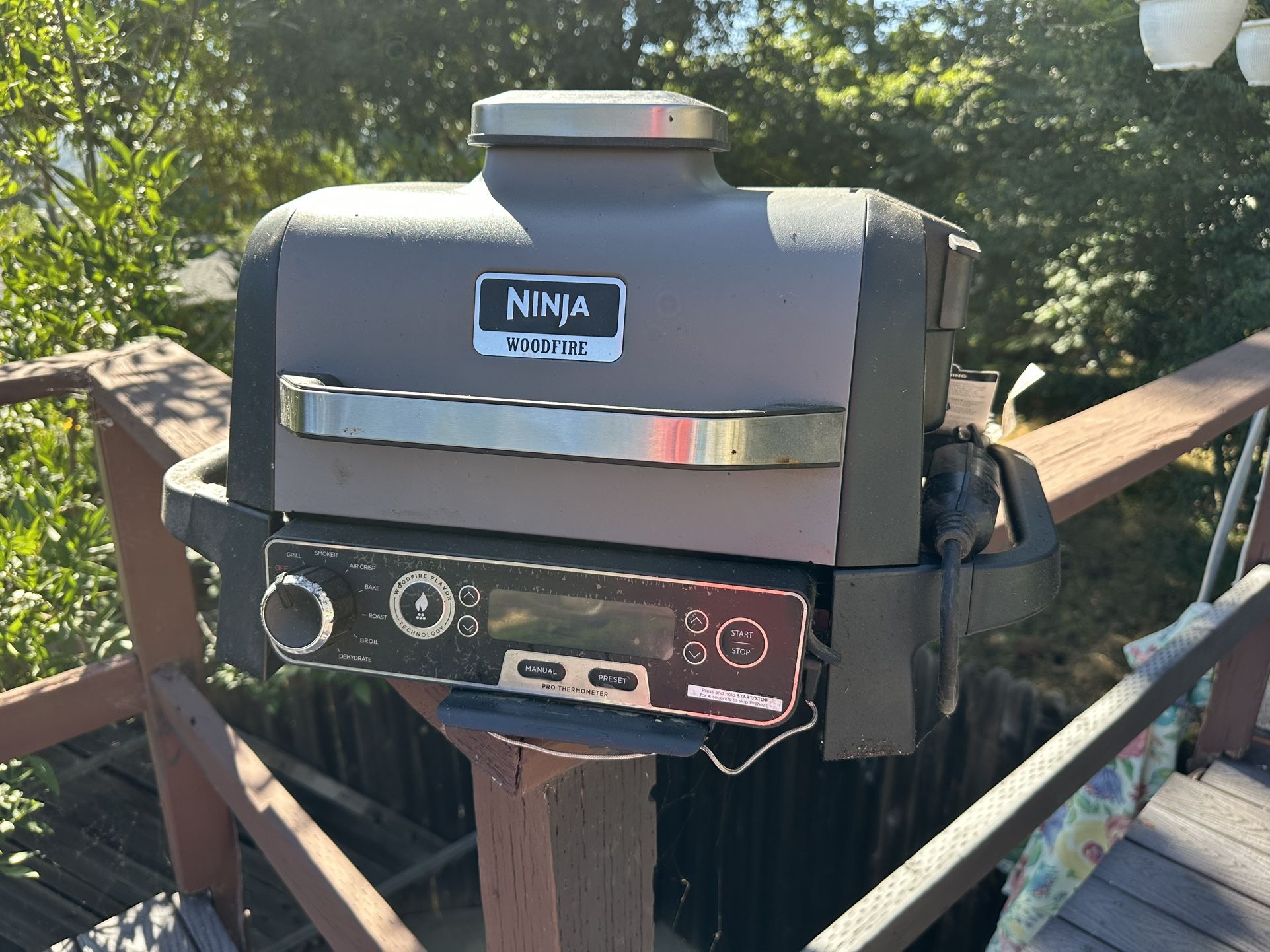 Ninja Woodfire Electric Outdoor Smoker & AirFry Grill with Griddle