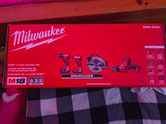 2 Milwaukee combo kits and 2 extra batteries all new