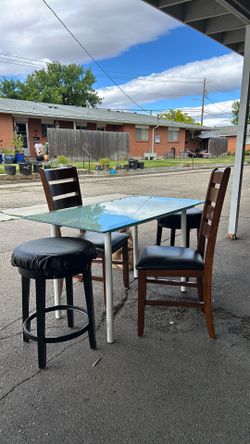 Small table with glass top  & 4 chairs