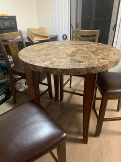 Brown and marble five piece dinette set