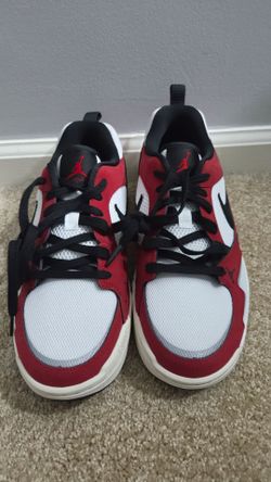 These are Jordan CMFT Era sneakers in the "Chicago" colorway, featuring a white, red, and black mesh and leather upper.