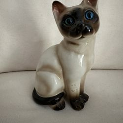 Vintage Mid Century Ceramic Siamese Cat figurine with blue glass eyes