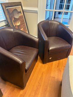 2 faux leather club chairs