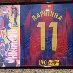 RAPHINHA OF THE BARCELONA SOCCER TEAM,BRANDED, AUTHENTIC FRAMED JERSEY.