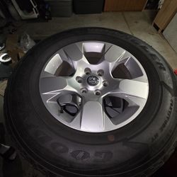 Stock Ram Rims With USED tire