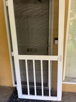 FREE! Front screen door. 36”x80” white vinyl