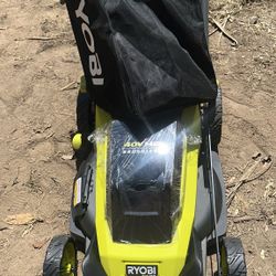 Ryobi Lawn Mower Self Propelled  21’. In  come W/1-6Ah battery and fast Charger