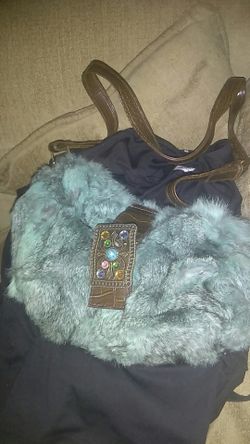 Stylish blue rabbits fur purse with extra stap