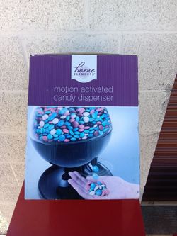 Candy dispenser motion activated