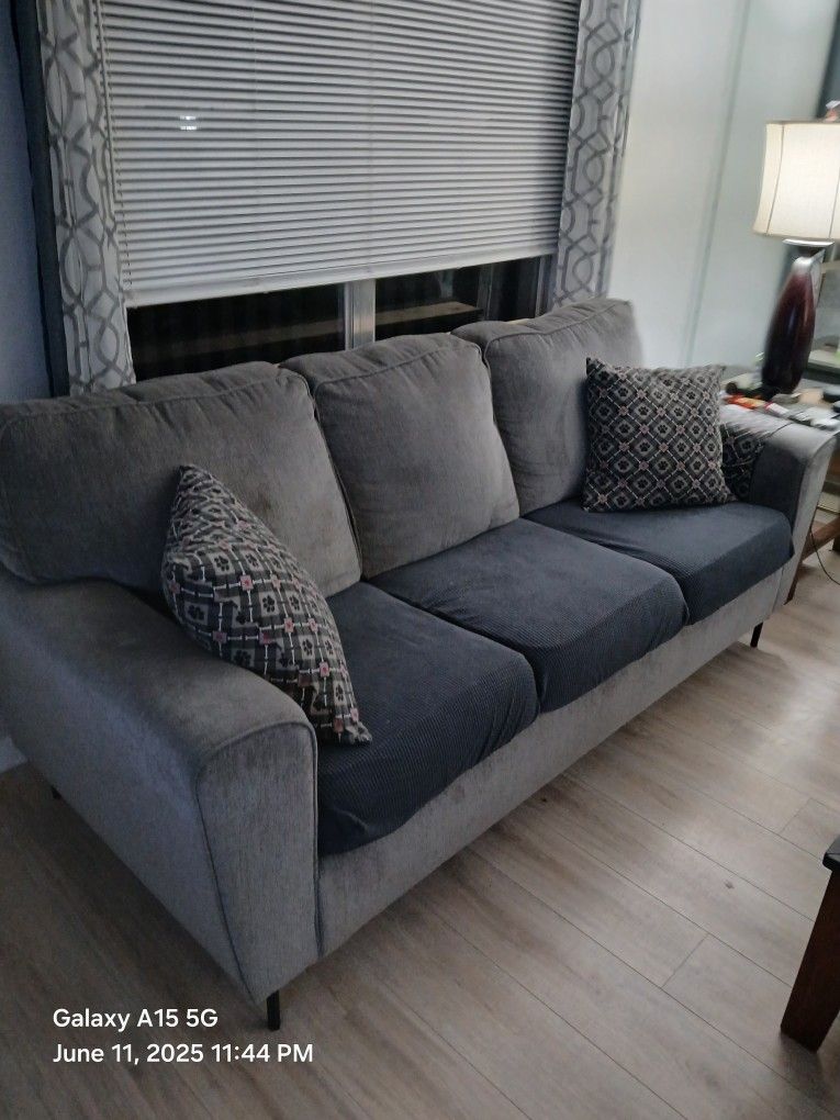 Sofa, 85 Inches Long With homemade pillows.