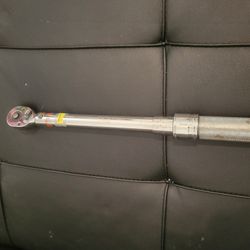 micrometer click-style torque wrench. 