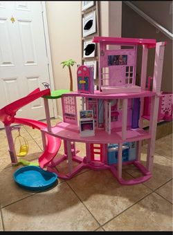 Barbie dream house and pizza cart