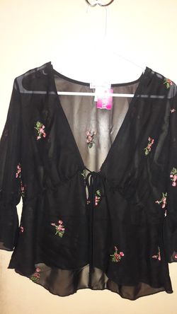 New black translucent with flower blouse.