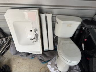 White porcelain sink, white toilet, green glass vanity top all for $200