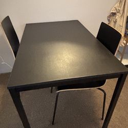 Black dining table and chairs