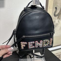Vintage Black Fendi mini backpack with studs and lettering #FendiBackpack #MiniBag