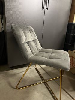 Upholstered grey chair