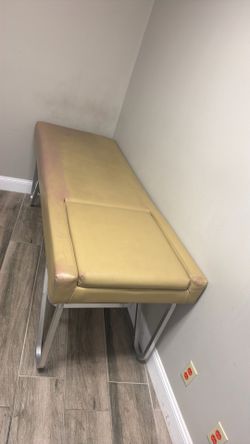Therapy exam table