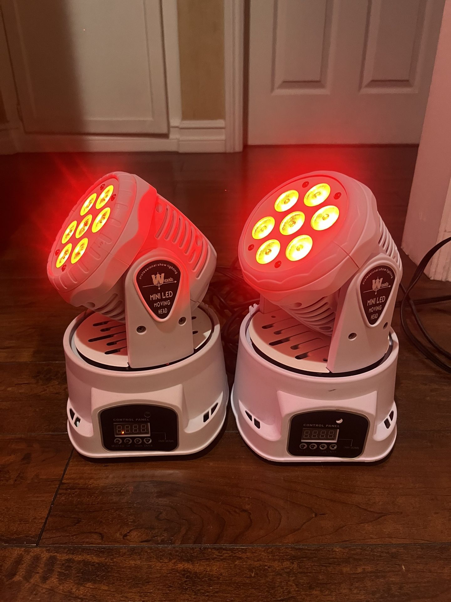 2 x White Mini LED DJ Moving Head Lights - Sound Activated & DMX Control Product Description: Elevate your event's lighting with this professional-gr