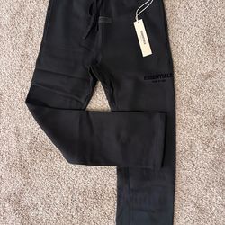 Essentials fear of god uncuffed sweats size Xs