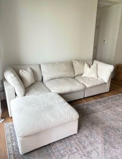 White fluffy sectional couch