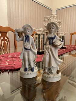 Boy and girl figurines