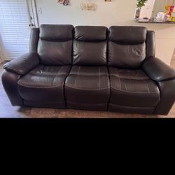 Harvey Leather Power Reclining Sofa with Power Headrests.