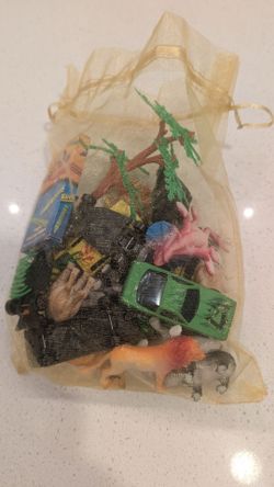 Toy cars and animal figurines