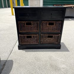 Wood Table With Wicker Storage Bins
