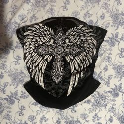 Black top with rhinestones and wings