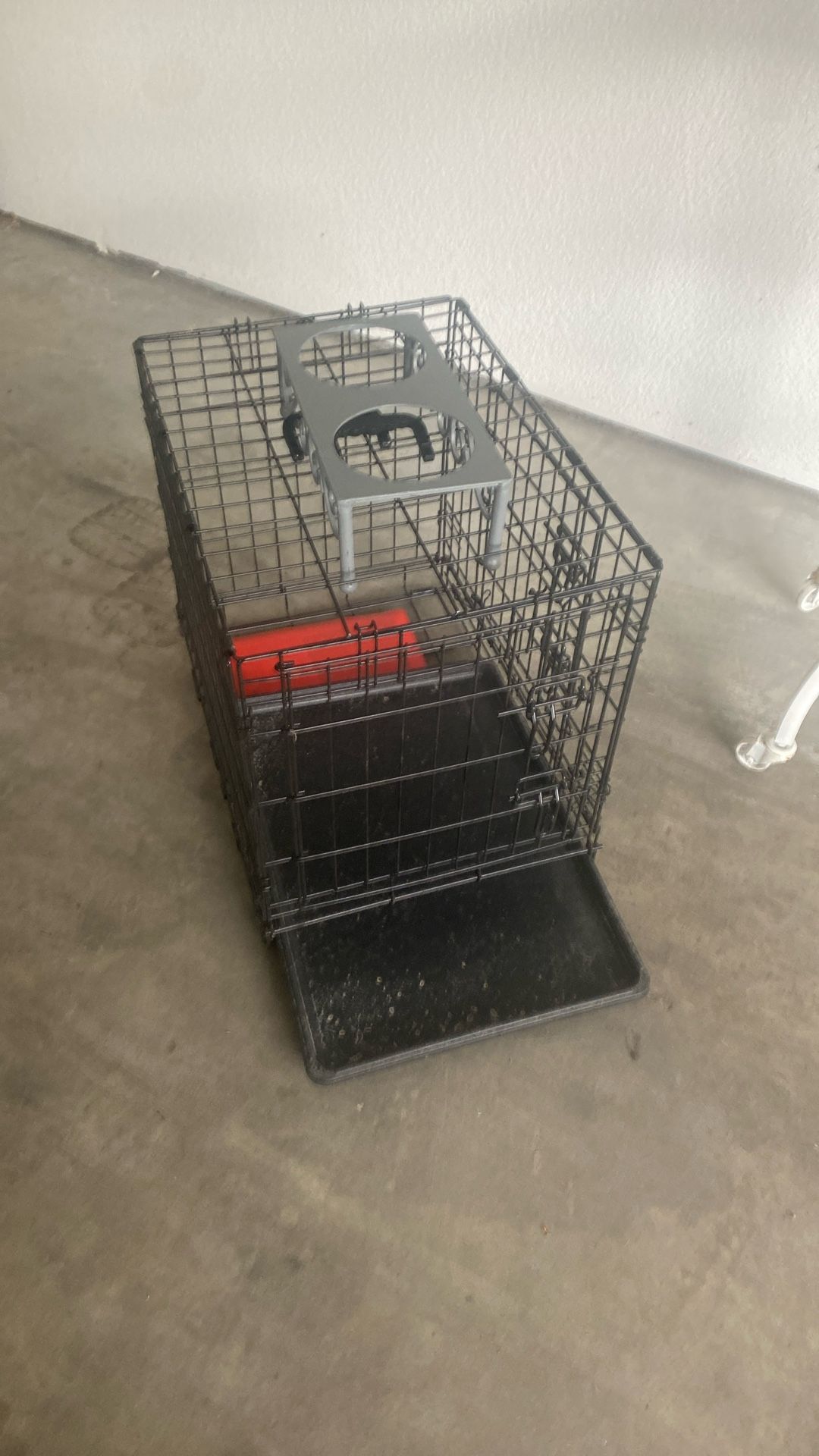 Dog Kennel, And Food And Water Dish