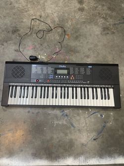 Electric piano 34 by 13 inches