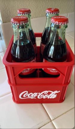 Plástico. Coca cola box