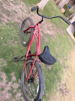 Red huffy beach cruiser bike