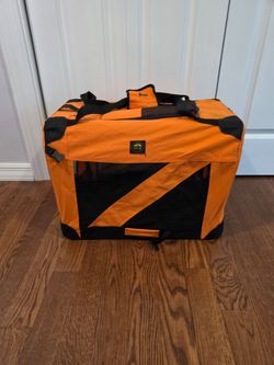 Pet Life orange soft-folding collapsible pet crate with black mesh