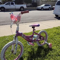 pink and purple children's bicycle