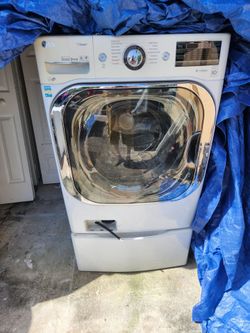 LG 27" COMBO WASHER AND DRYER SUPERCAPACITY IN ONE MACHINE