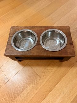 Elevated wooden stand for dog with dog bowls