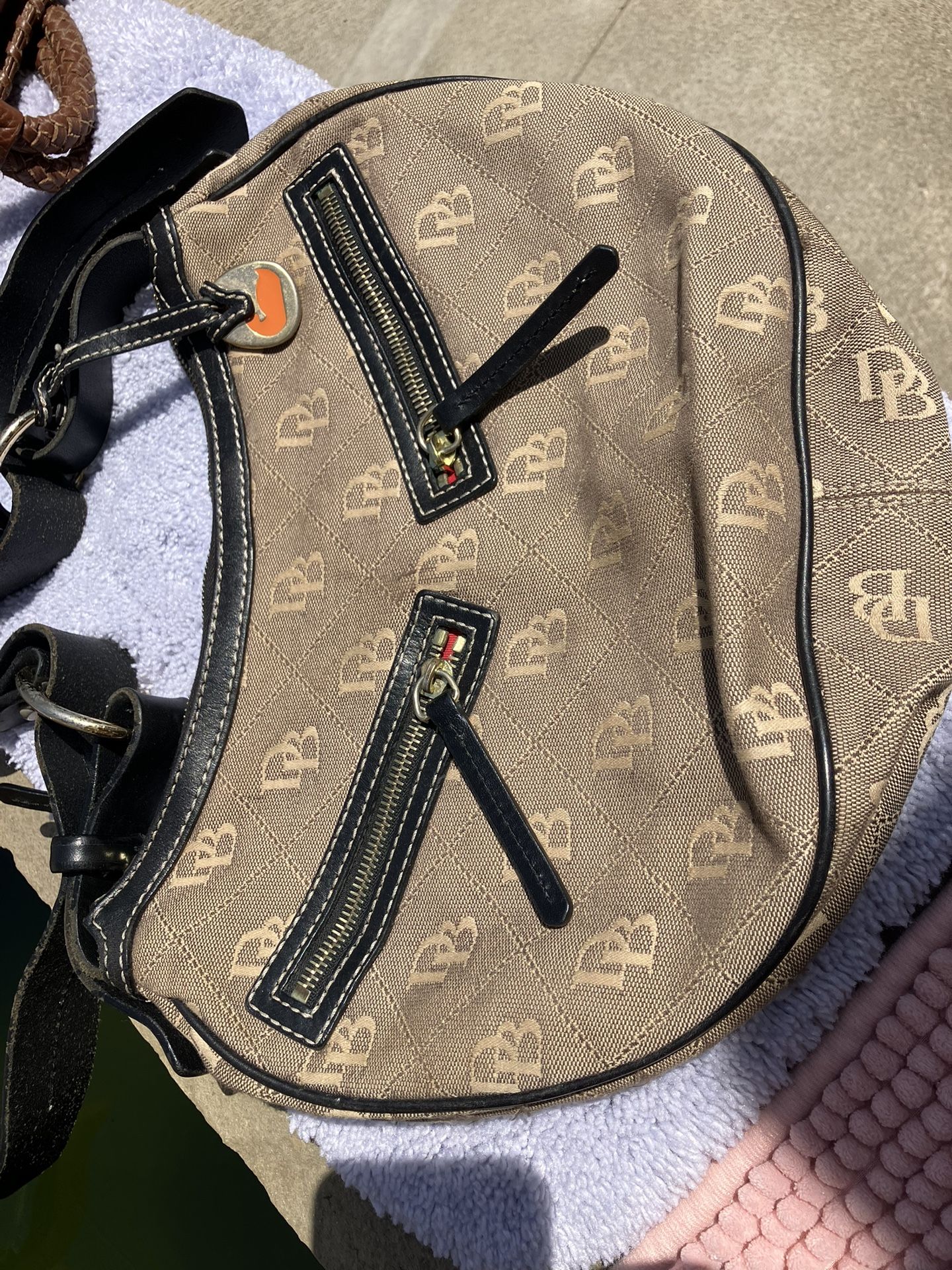 DOOENY BURKE PURSE goes With Any Outfit