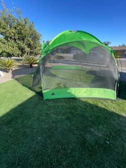 Ozark. 14’x14’ camping tent screen house 7’ tall 2 door excellent complete condition. Storage bag is ripped.