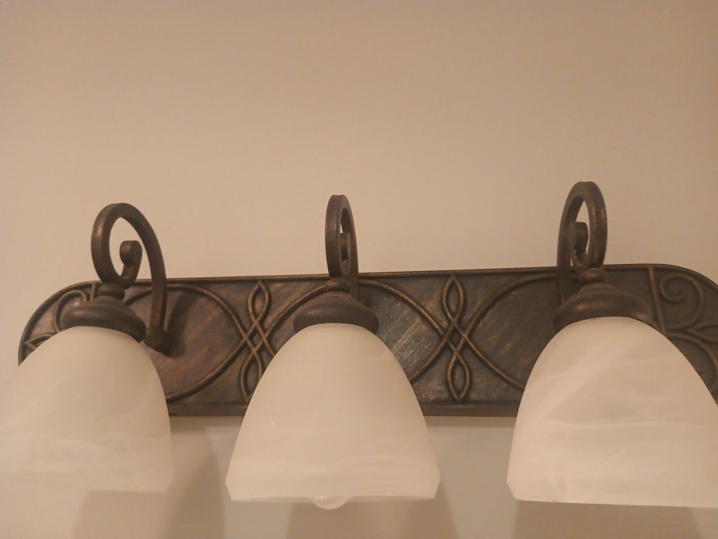 2 Vanity Light Fixtures . 3 Bulbs Each